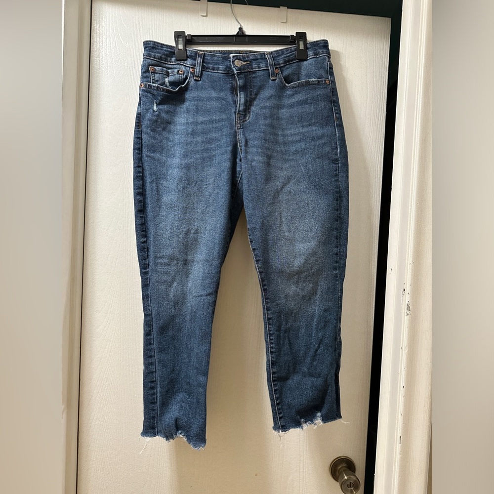 Distressed crop Denizen from Levi’s jeans. Dark color blue. Women’s size 12.